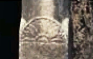 A halk-flower medallions design on a pillar of Cave No.19, typical of early designs such as those of Sanchi.