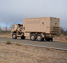An Oshkosh-produced M1087 A1R MTV Expansible Van in A-kit configuration
