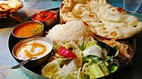 Traditional North Indian vegetarian thali with various curries from India. Various curry dishes are found across South Asia.