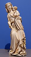 Room 40 – Ivory statue of Virgin and Child, who is crushing a dragon under her left foot from Paris, France, 1310-1330 AD
