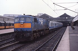 The Enterprise train being run by NI Railways branded coachs 19 October 1985, 10:57