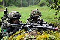 Austrian Army soldiers with MG 74 [es] and Steyr AUG during a maneuver