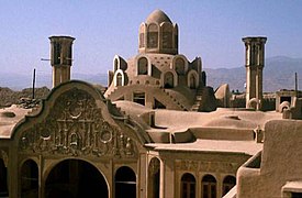 Borujerdi House, in Kashan, central Iran. Built in 1857, it is an excellent example of ancient Persian desert architecture. The two tall windcatchers cool the andaruni (courtyard) of the house.