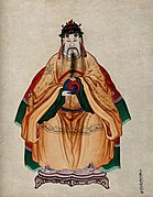 Chinese emperor Fuxi, wearing a traditional costume, holding the yin yang symbol, 19th century