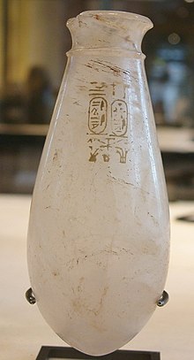 A small glass vase with the cartouches of Rudamun