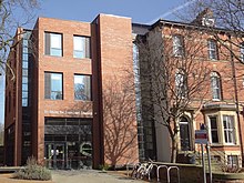 A photograph of the Institute for Transport Studies building on the University of Leeds campus in February 2018.