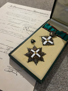 Grand Officer set of insignia with the bestowal document