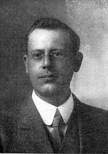 Man with glasses in suit