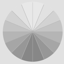 A gray circle with rotating shading of grays with strokes on it dividing up the circle in 16 even parts.