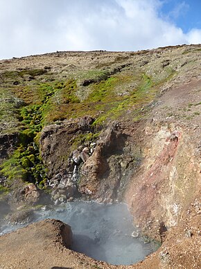A hot spring at the base of the Hengladalir valleys