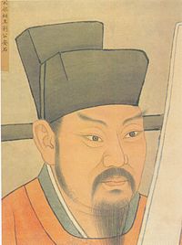 A head-shot style painting of a middle aged to late middle aged man with pointed eyebrows, sideburns, a mustache, and a beard. He is wearing a red robe and a black, square cut hat.