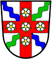 a bendlet sinister—Argent, a bendlet wavy azure and a bendlet sinister wavy vert, over all on a cross gules five roses argent barbed and seeded proper—North Yorkshire County Council, England