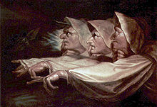 Painting showing three faces with hooked noses in profile, eyes looking up. Each has an arm outstretched with crooked fingers.