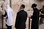 Jews praying at the Western Wall.