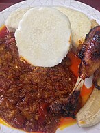 Cooked yam and plantain, with "garden egg" (aubergine) stew and chicken