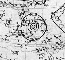 Map showing contours of pressure, with concentric circles indicating a pressure minimum and signifying the hurricane's position