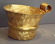 Gold cup from Mycenae decorated with triskelions