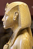 Profile of a statuette of Akhenaten wearing a nemes, c. 1351 – c. 1332 BCE