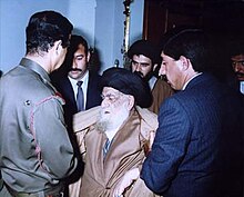 Islamic cleric with Saddam Hussein