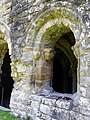 One of the two windows in the cloister wall of the chapter house.