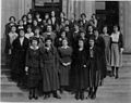 Ethel McCollough, center, poses with library staff on the steps of the Coliseum