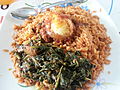 Image 9Jollof rice with vegetables and a boiled egg (from Malian cuisine)