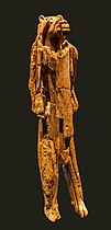 Tall figurine with a humanoid body and lion's head