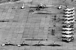 Aerial photo of planes and soldiers at an airport