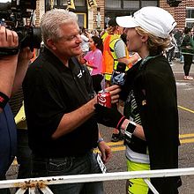 Bob Barry Jr. interviewing marathon runner Camille Herron after her win at the 2015 Oklahoma City Memorial Marathon.