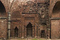 Ruined mihrabs and arabesque inside Darasbari Mosque, 15th-century