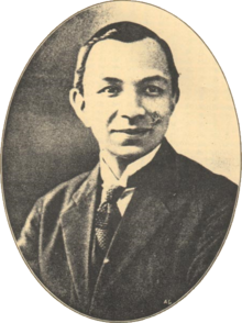 Head-and-shoulders portrait of a Eurasian gentleman in a suit
