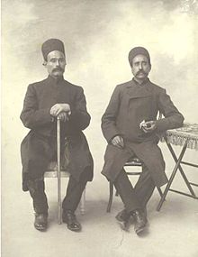 Two seated men