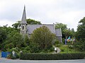 ehemalige Kirche in Glengarriff, die zum Verkauf angeboten wird (bitte auf das kleine, weiße Schild mit blauer Schrift schauen)