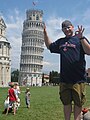 Forced perspective: the man is made to appear to be supporting the Leaning Tower of Pisa in the background.