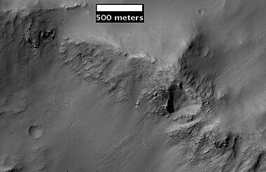 Layers along crater rim in Terra Sirenum, as seen by HiRIS under the HiWish program