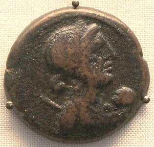 A coin depicting Cleopatra VII with her son Caesarion as an infant, British museum.[26]