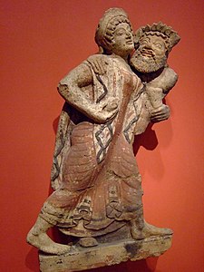 Roof ornament (antefix) in the shape of a dancing Maenad and a Satyr Etruscan, 500–475 BCE, Getty Villa, Los Angeles, California