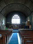 Parish Church of St Sadwrn including adjacent Cross Shaft