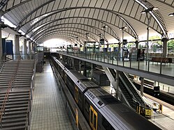 Olympic Park station in Sydney. All passengers alight on the middle island platform and board from the significantly wider outer platforms during major events.