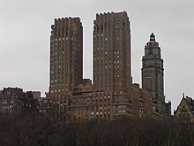 The twin towers of the Majestic as viewed from Central Park, looking west. A neighboring apartment tower can be seen on 72nd Street behind the Majestic.