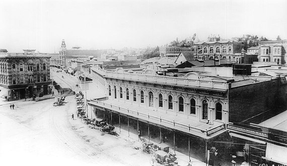 North end of the Downey Block along the west side of Main St., 1887. Temple Block at left; Spring Street runs towards the Phillips Block (tower) in the background at center-left.