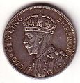 Obverse of the commemorative 1934–35 Australian florin, with King George V, designed by Percy Metcalfe.