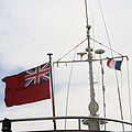 Superyacht Ariane NI in Toulon harbour, flying her British ensign and a French courtesy flag