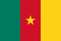 The flag of Cameroon, a charged vertical triband.