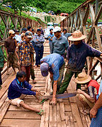 Locals maintaining a bridge