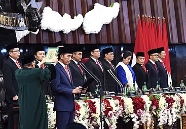 Indonesian President Joko Widodo and members of parliament wearing peci as part of national formal attire