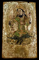 Persian deity on the reverse of a painted panel, probably depicting the legendary hero Rustam. Khotanese artist Viśa Īrasangä or his father Viśa Baysūna, 7th century