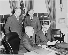 Secretary of Defense George C. Marshall with President Truman, Secretary of State Dean Acheson, and Prime Minister of France Rene Pleven during Pleven visit to Washington D.C., at the White House on 29 January 1951.