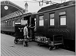 Norsk Spisevognselskap delivering produce to a passenger train at Oslo East Station in 1935
