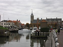 The port of Willemstad with the tower of the former city hall in the back